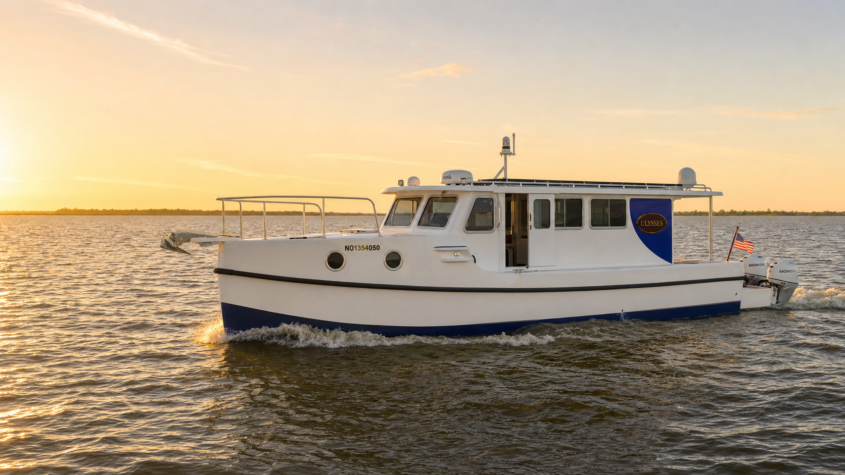 Ulysses, a white shallow-draft cruising trawler with a blue hull bottom, crosses the Currituck Sound in warm golden-hour light.